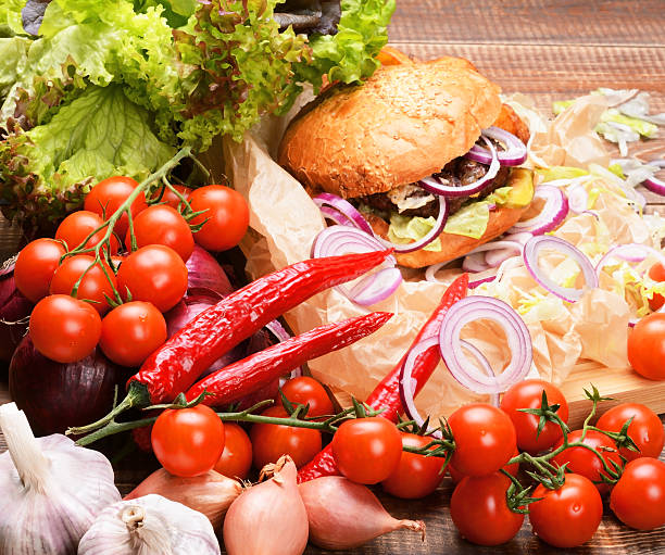istock Delicious homemade burger with fresh vegetables and beef. 480614512
