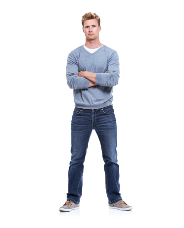 A handsome man isolated on white with his arms folded