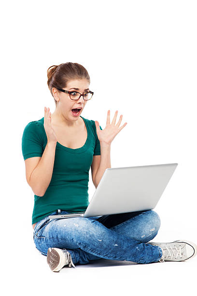 istock Shocked Woman Looking At Laptop 480615003