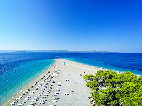 Famous beach Zlatni rat (Golden Horn or Golden Cape), Bol, Brac island, Dalmatia, Croatia, Europe. High angle view from quadcopter Phantom 2 with GoPro Hero 3 Black camera.