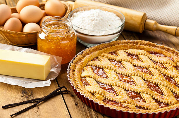 istock Homemade italian crostata with ingredients on a rustic wood table 480615610
