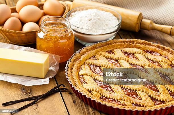Homemade Italian Crostata With Ingredients On A Rustic Wood Table Stock Photo - Download Image Now