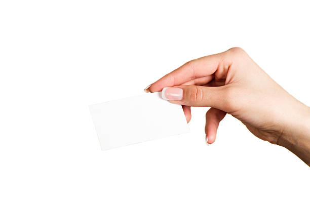 istock Female hand holding a blank business card 480616654