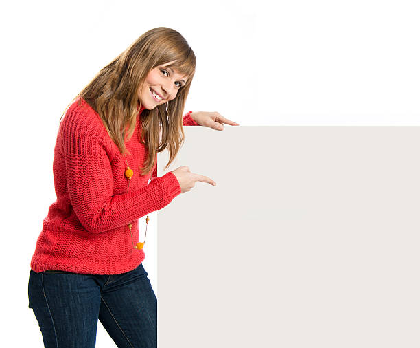 istock Young blonde girl holding placard 480617235