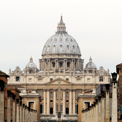 Rome, Italy (Vatican) - March 8, 2014: the Basilica of St. Peter in Vatican City State in a compressed perspective along via della Conciliazione.