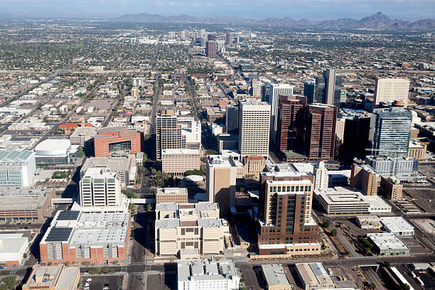 Aerial view of Phoenix, Arizona An aerial view of the business district of Phoenix, Arizona taken from a plane about to land at Phoenix Sky Harbor International Airport.  rr Phoenix Headhunters stock pictures, royalty-free photos & images