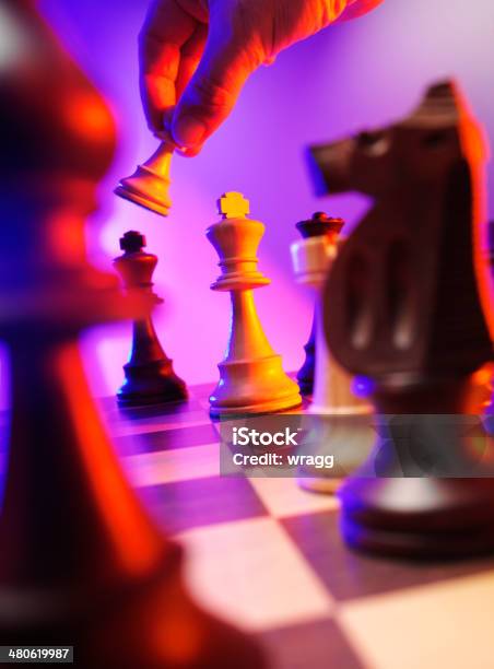 Pawn Taking The King Chess Piece In A Board Game Stock Photo - Download Image Now - Bishop - Chess Piece, Chess, Chess Board