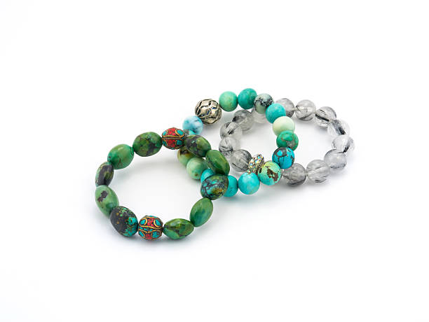 istock turquoise bracelet stone on white background 480621098