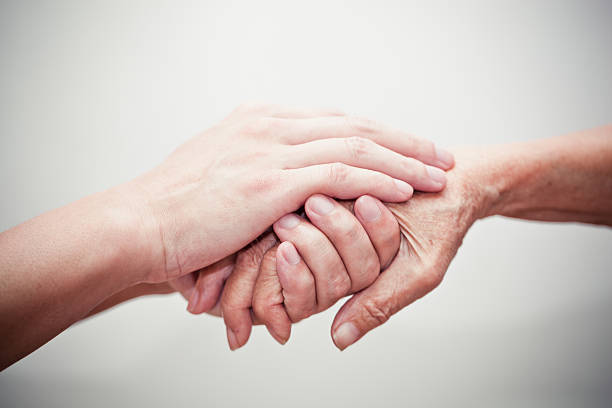 支援の手 - assistance holding hands friendship human hand ストックフォトと画像