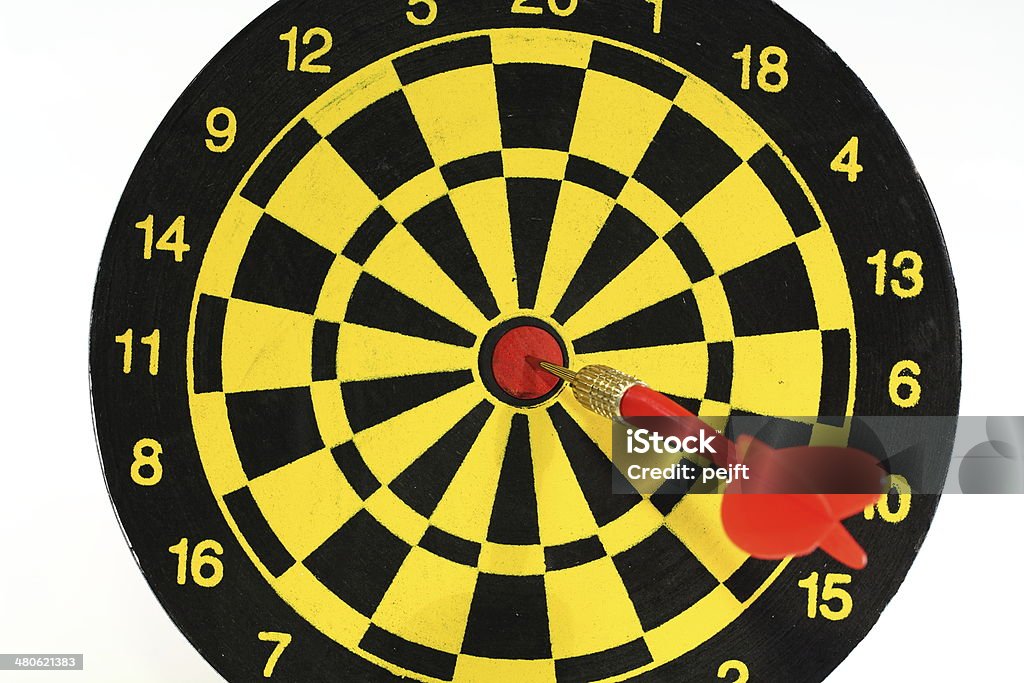 Success! Dart in Bulls eye Success! Bulls eye direct hit Accuracy Stock Photo