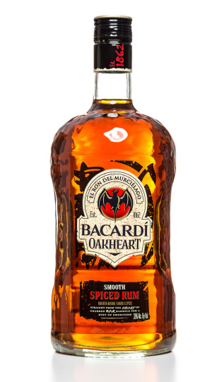 Miami, USA - March 14, 2014: Bacardi Oakheart Smooth Spiced Rum bottle. Bacardi brand is owned by Bacardi & Company Limited.