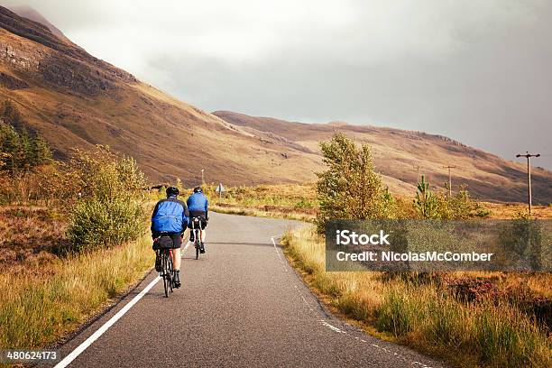 Cycling Through The Highlands Stock Photo - Download Image Now - Cycling, Scotland, Bicycle