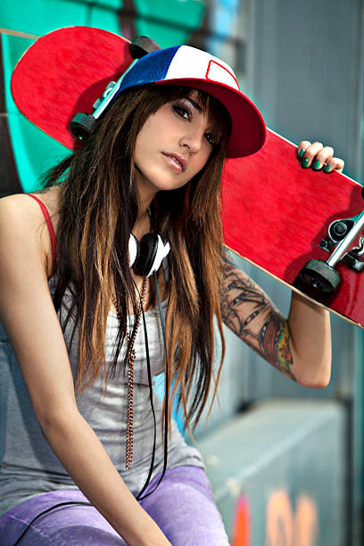 istock Young Woman With Skateboard 480624253