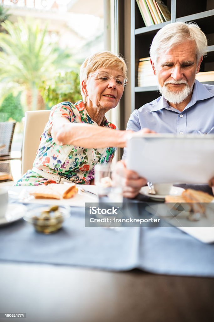 senior couple thave a breakfast at cafe Computer Stock Photo