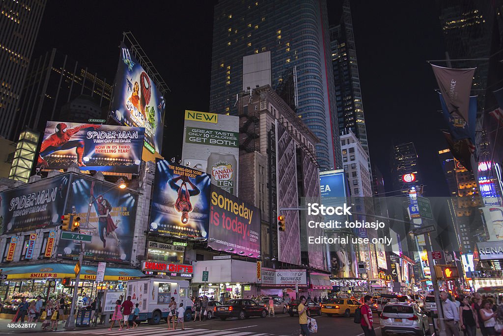 Times Square Manhattan at night New York City, USA - June 1, 2013: This photo shows the busy and crowded Times Square at Manhattan in New York City during night. Activity Stock Photo