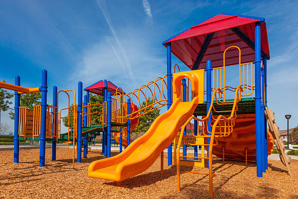 色鮮やかなプレイグラウンド - playground schoolyard playful playing ストックフォトと画像