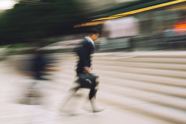 istock Businessman running on the street 480628632