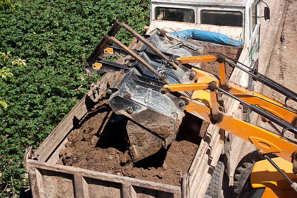 istock Excavator and dump truck 480629360