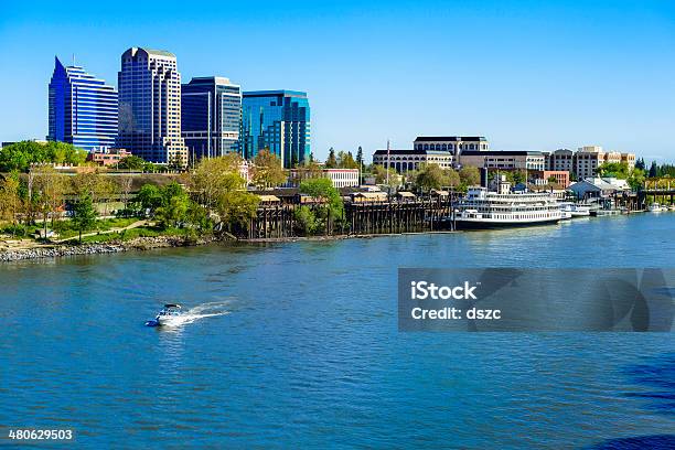 Sacramento River Riverfront And Downtown Skyline Stock Photo - Download Image Now - Sacramento, California, Riverbank