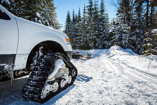 istock Tracked Snow Vehicle in Winter Forest 480629567