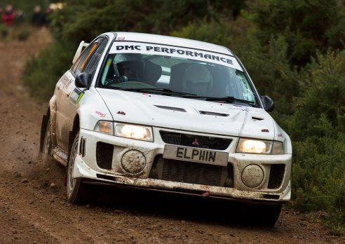 Tain, Ross and Cromarty, Scotland, United Kingdom - February 22, 2014: This is one of the cars in the Snowman Rally part of the Scottish Rally Championship at Stage 5 within Scotsburn Forrest, Tain, Ross and Cromarty, Scotland on 22 February 2014.