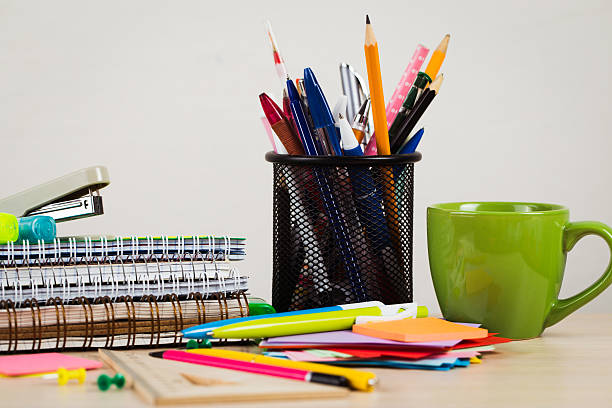 istock School and office accessories on wooden background 480632212