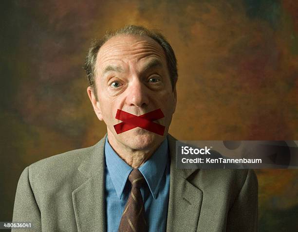 Man With Tape Across Mouth Stock Photo - Download Image Now - Adhesive Tape, Businessman, Covering