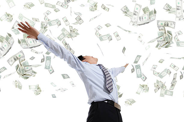 istock business man hug money 480636367