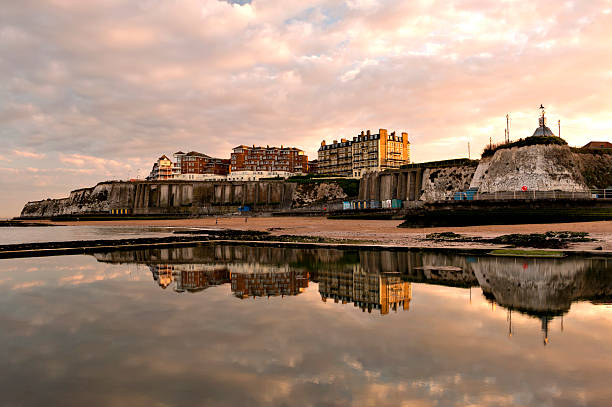 Reflections at dusk. An image taken of reflections in the rock pool, on Viking Bay beach, at Broadstairs in Kent.  isle of thanet photos stock pictures, royalty-free photos & images