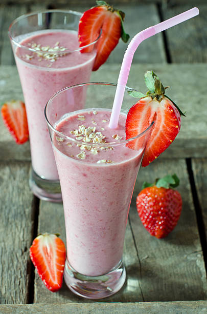 istock Strawberry smoothie on a wooden table 480637469