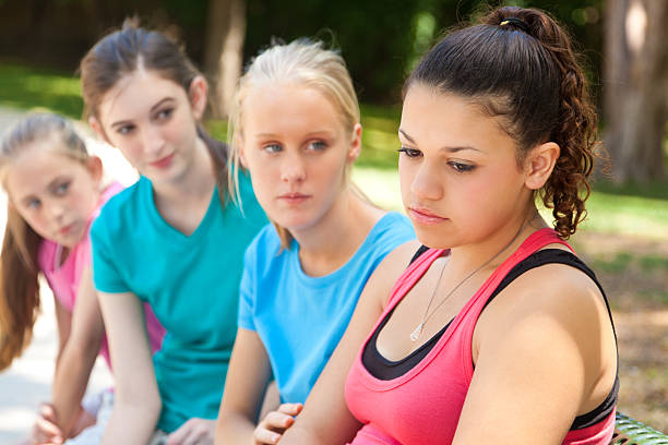 istock Sad young girl receiving support from girlfriends 480640735