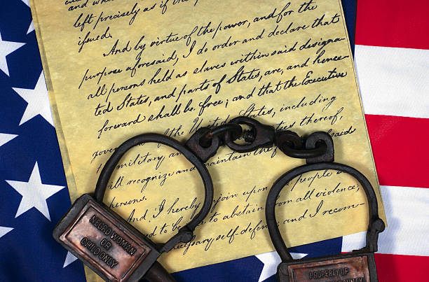 Emancipation Proclamation with Shackles The Emancipation Proclamation is an executive order issued by President Abraham Lincoln on January 1, 1863, during the American Civil War. The Proclamation immediately freed 50,000 slaves from the shackles of slavery. emancipation proclamation stock pictures, royalty-free photos & images