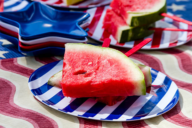 Watermelon on a stick at picnic