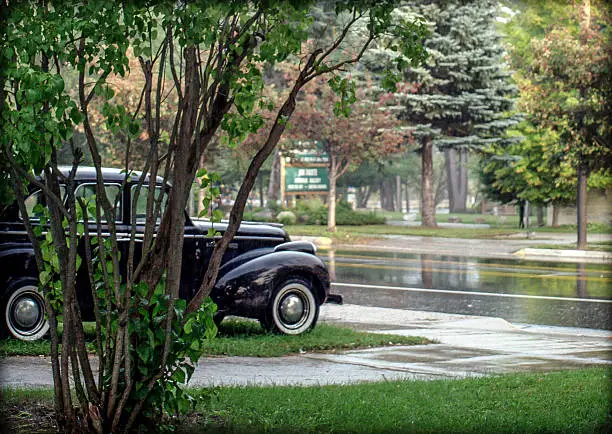 1938 Buick 8 classic auto in a mid summer rain storm.
