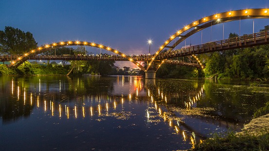 The Tridge is the formal name of a three-way wooden footbridge spanning the confluence of the Chippewa and Tittabawassee Rivers near downtown Midland, Michigan, in the Tri-Cities region