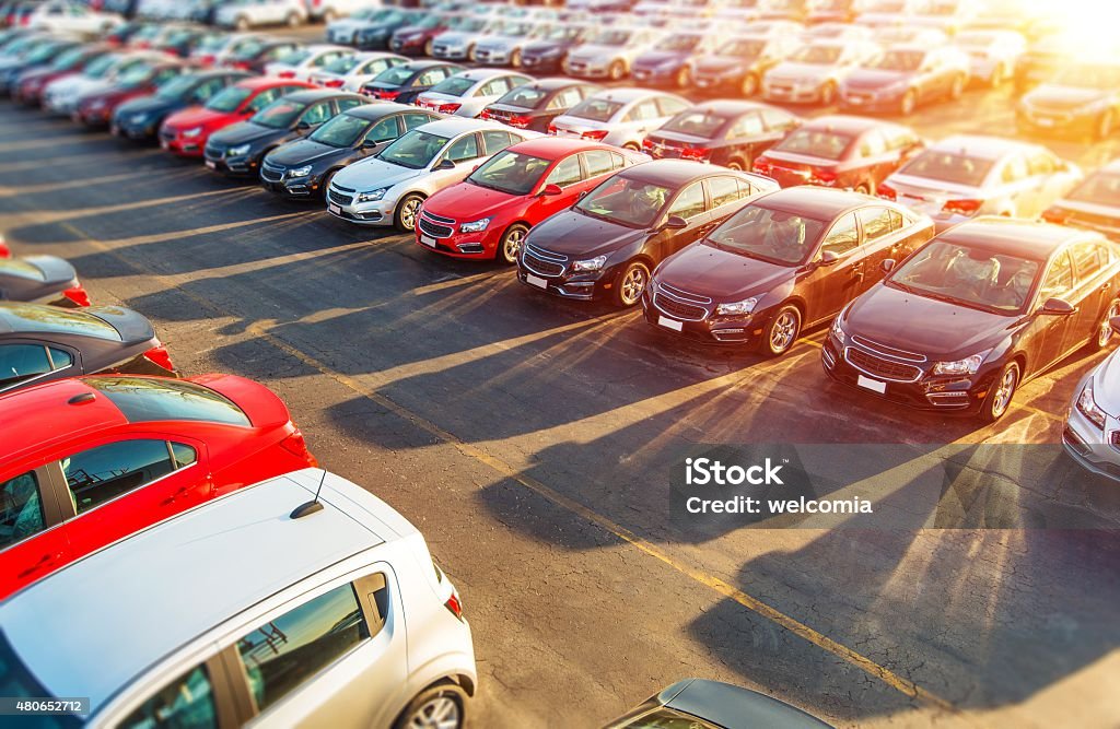 Dealer New Cars Stock Dealer New Cars Stock. Colorful Brand New Compact Vehicles For Sale Awaiting on the Dealer Parking Lot. Car Market Business Concept. Car Stock Photo