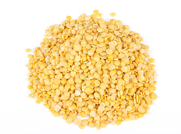 istock Yellow lentils isolated on white background.Macro shot 480654225
