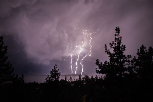Bolts of lightning strike on Lake Tahoe.  Taken on July 8th, 2015.