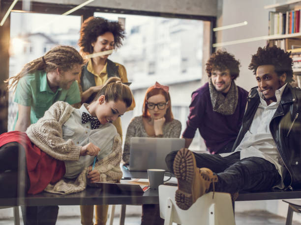 istock Smiling group of creative people working in the office. 480662658