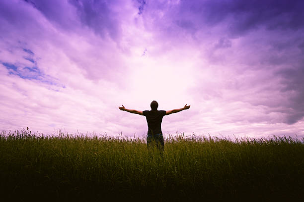 istock Male silhouette on sunrise background 480663430