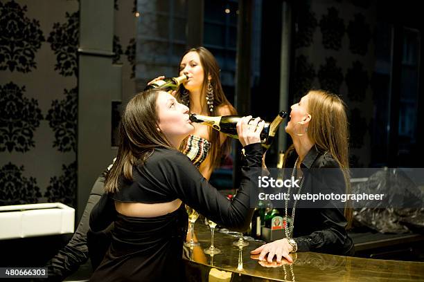 Drinking Champagne From Bottle Stock Photo - Download Image Now - Adult, Adults Only, Alcohol - Drink