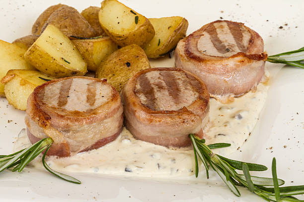 istock Grilled steak wrapped in bacon, with grilled vegetables, mashed 480669927