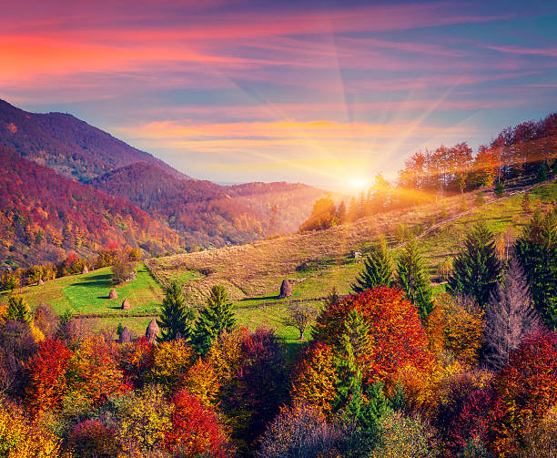 Colorful autumn morning in the mountain village stock photo