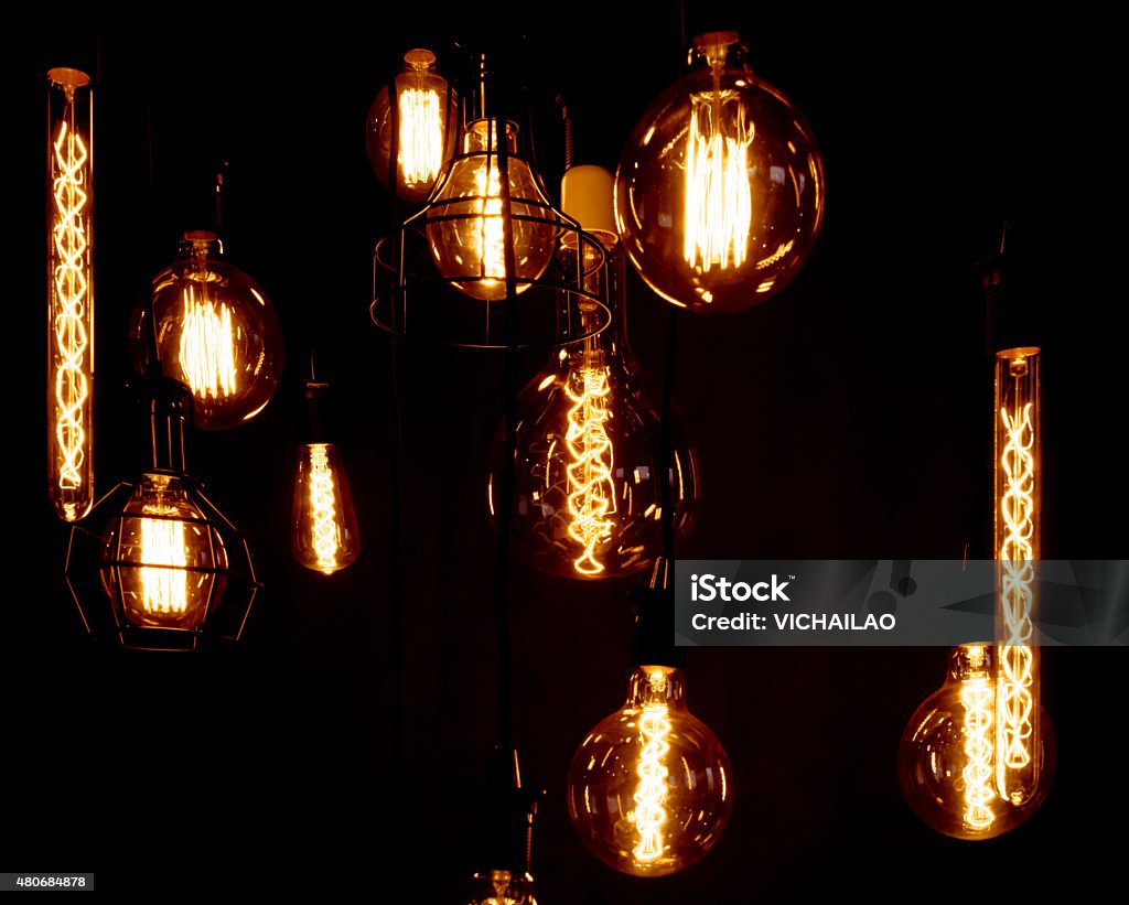 Light bulbs illuminated Vintage glowing light bulbs (light bulb, light, lamp) 2015 Stock Photo
