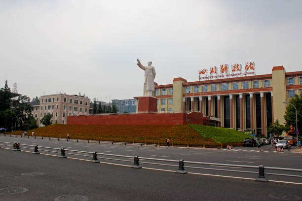 Chengdu, China - August 5, 2013: A massive statue of Mao Zedong stands over downtown Chendu in the Sichuan province.