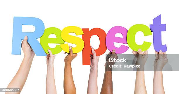 Group Of Diverse Peoples Hands Holding Word Respect Stock Photo - Download Image Now