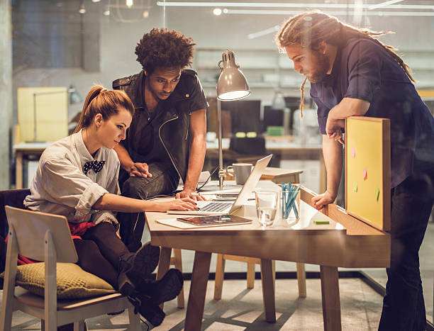 istock Creative people working on the laptop together in the office. 480687904