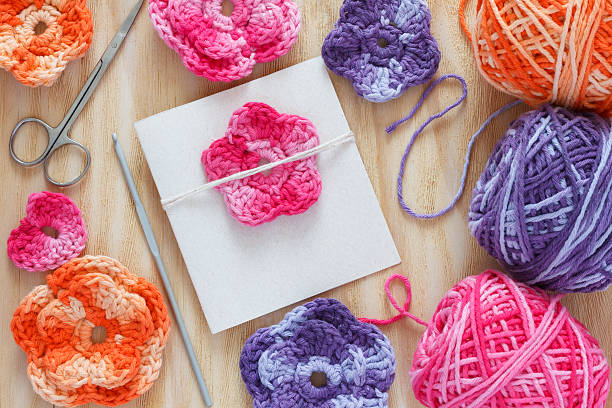 istock Handmade colorful crochet flowers and heart 480689040