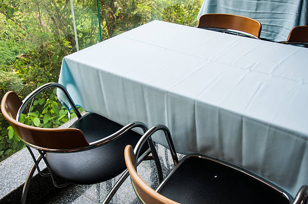 istock tables and chairs in a cafe 480692226