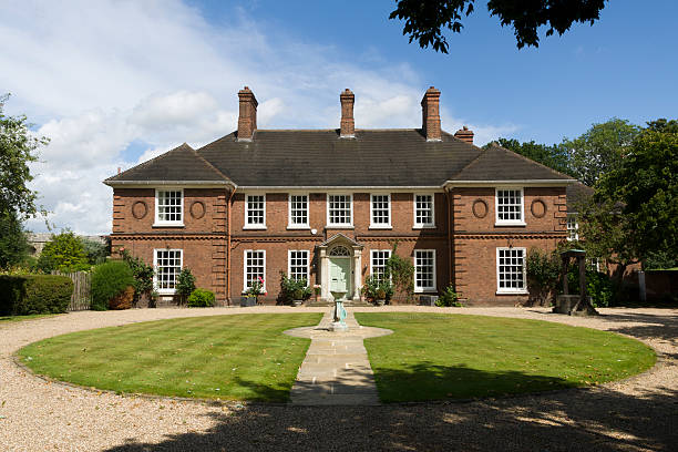 Calke Abbey, England -  October 20, 2014: Mansion is in care of National Trust and is presented as an illustration of the country house in decline, fate met by many other English country estates.